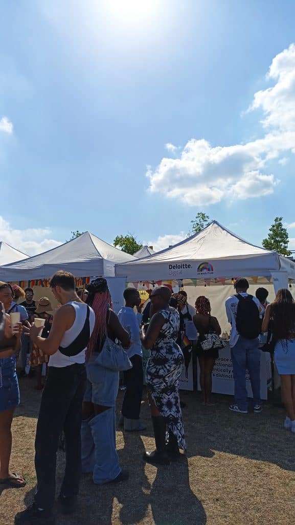 people queuing for ice cream rolls black pride